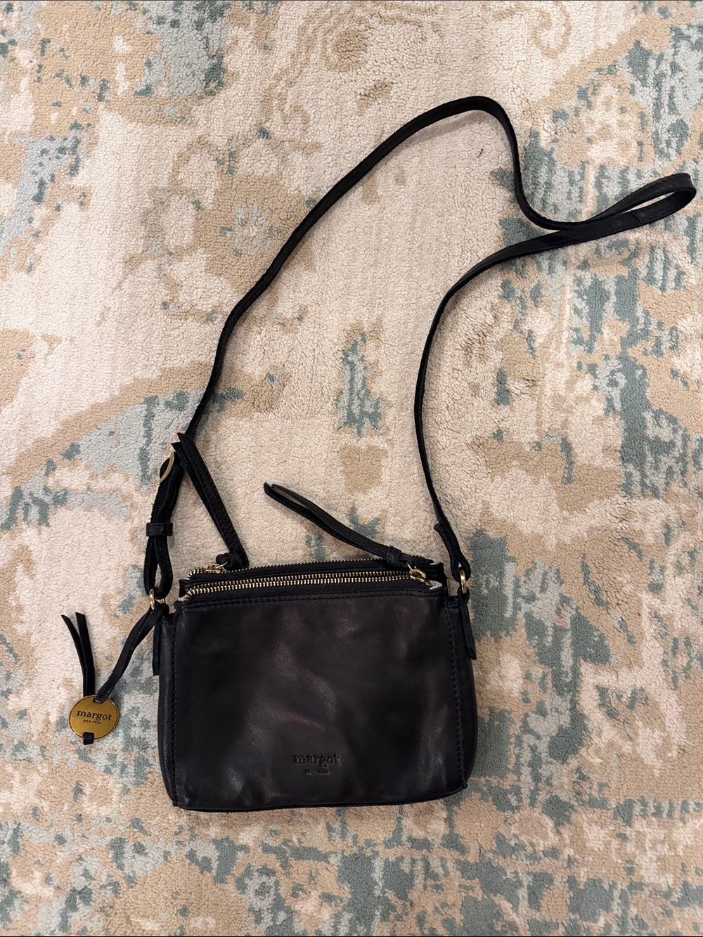 margot Black Leather Compact Crossbody with Gold Accent